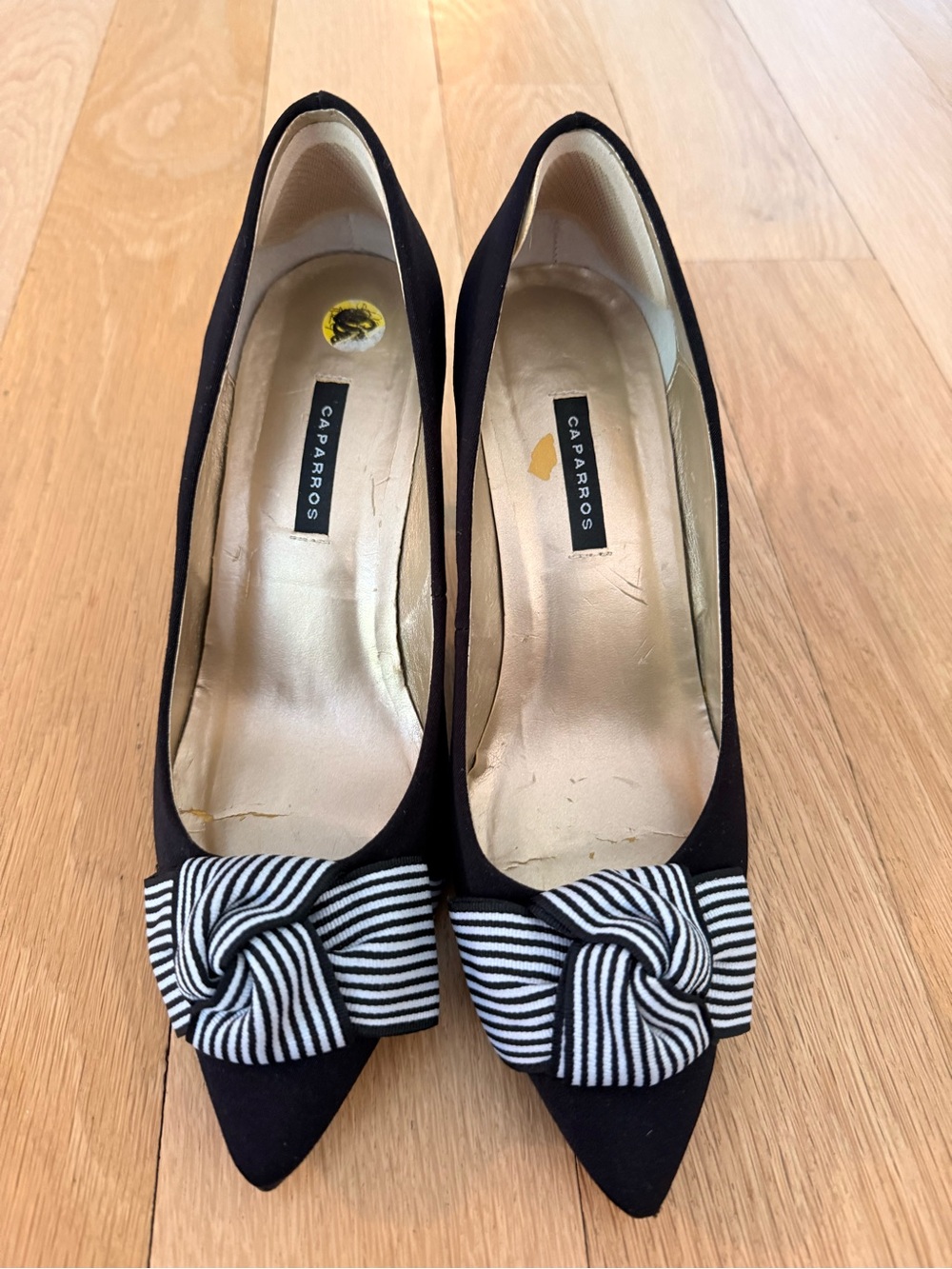 Caparros Black Pointed Toe Pumps with Black-and-White Striped Bow